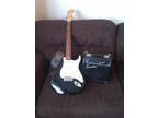 Fender Squier with SP-10 Squier Amp and strap