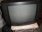 BUSH 20" COLOUR TV,  Black casing,  remote....
